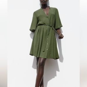 Green dress with woven belt